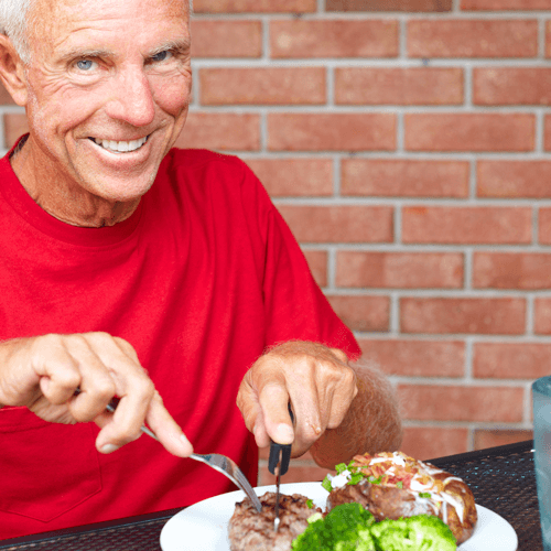 Man eating a steak